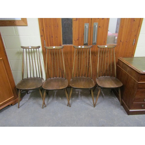 1929 - SET OF FOUR DARK OAK ERCOL SPINDLEBACK DINING CHAIRS