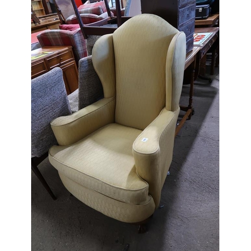 597 - WING BACKED ARMCHAIR