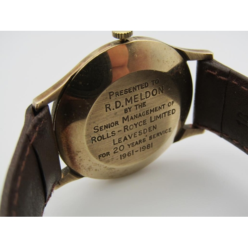 1608 - 9ct GOLD GARRARD AUTOMATIC WATCH ON BROWN LEATHER STRAP