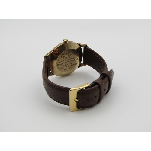 1608 - 9ct GOLD GARRARD AUTOMATIC WATCH ON BROWN LEATHER STRAP
