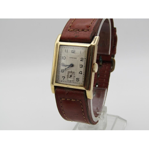 1609 - 14ct GOLD LONGINES GENTS WATCH ON BROWN LEATHER STRAP