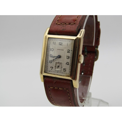 1609 - 14ct GOLD LONGINES GENTS WATCH ON BROWN LEATHER STRAP