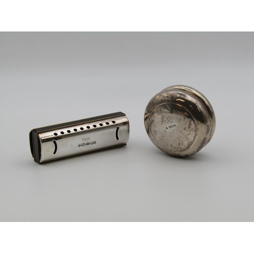 1615 - ASPREY SILVER HARMONICA AND A SILVER ASPREY CASED YOYO