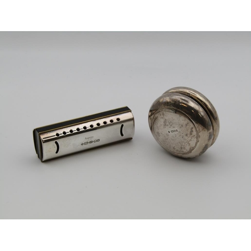 1615 - ASPREY SILVER HARMONICA AND A SILVER ASPREY CASED YOYO