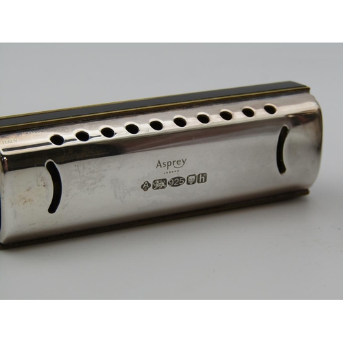 1615 - ASPREY SILVER HARMONICA AND A SILVER ASPREY CASED YOYO