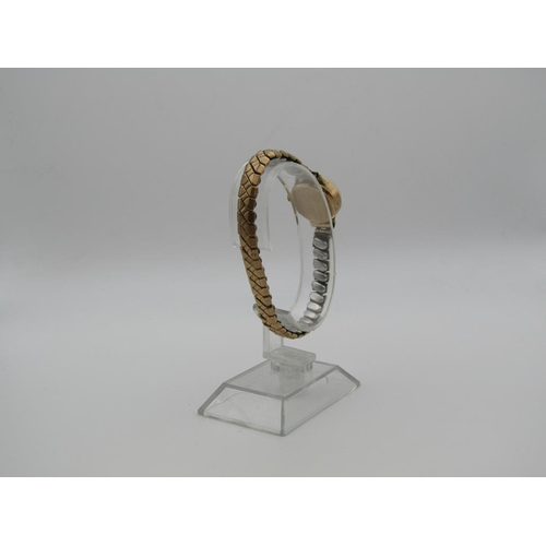 1630 - 9ct GOLD CASED AVIA LADIES WATCH ON EXPANDING PLATED STRAP