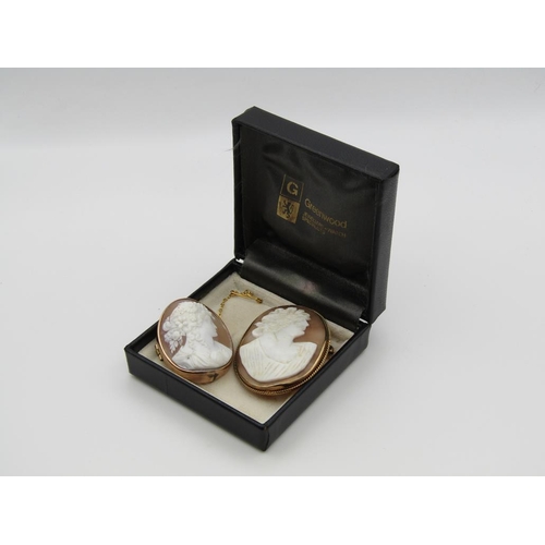 1635 - TWO GOLD/GILT METAL FRAMED CAMEO BROOCHES