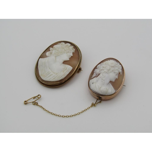 1635 - TWO GOLD/GILT METAL FRAMED CAMEO BROOCHES