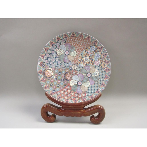 1959 - ORIENTAL CHARGER ON A WOODEN STAND 46cms DIA - A/F