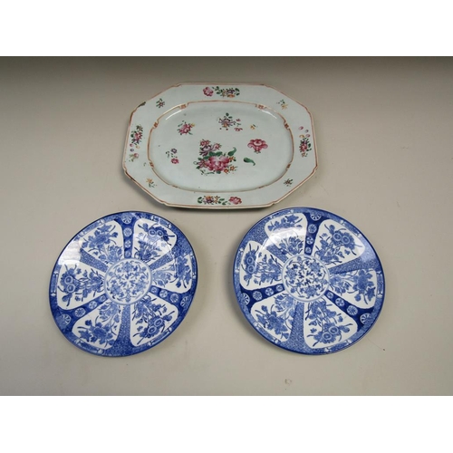 2004 - PAIR OF ORIENTAL BLUE AND WHITE PLATES AND A FAMILLE ROSE MEAT PLATTER, 41cms W