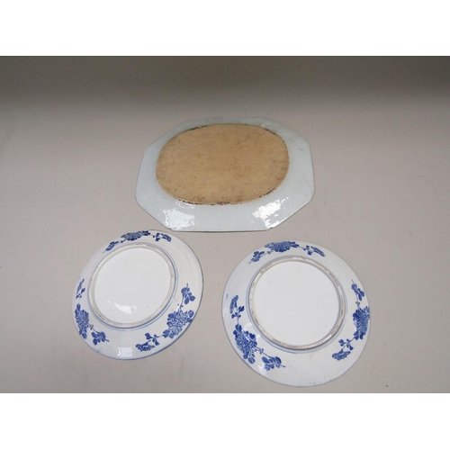 2004 - PAIR OF ORIENTAL BLUE AND WHITE PLATES AND A FAMILLE ROSE MEAT PLATTER, 41cms W