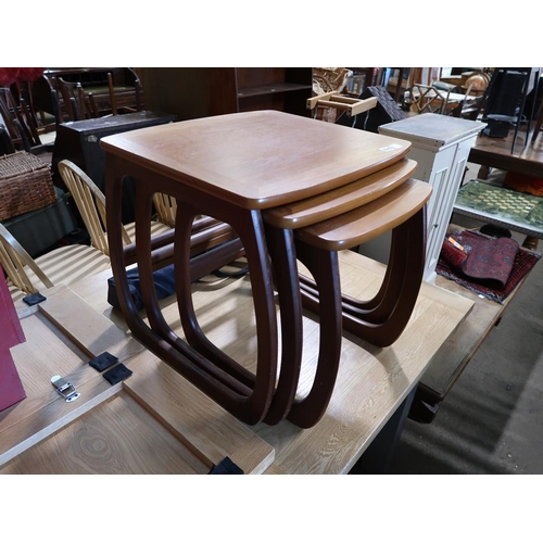 606 - NEST OF TEAK TABLES