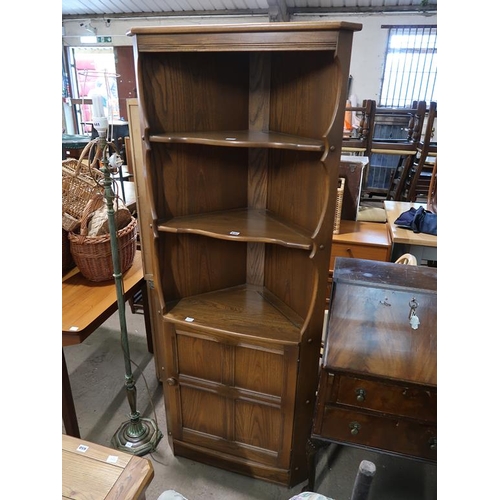 642 - ERCOL OAK CORNER CUPBOARD