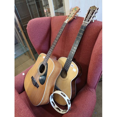 812 - TWO GUITARS AND A TAMBOURINE