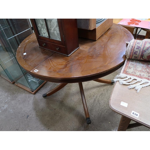 839 - YEW WOOD EXTENDING DINING TABLE