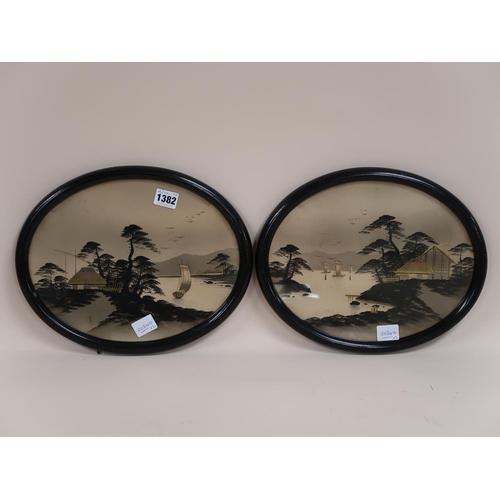 1382 - TWO JAPANESE FRAMED OVAL GILT HIGHLIGHTED LAKE SCENES, EACH 23CM X 29CM