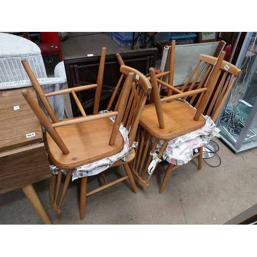 916 - FOUR SPINDLE BACK CHAIRS