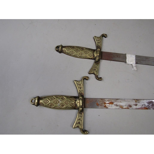 1455 - COLLECTION OF THREE KUKRIS; TWO IMITAION SWORDS; LEATHER COVERED DAGGER AND SHEATH; EMBOSSED BRASS P... 