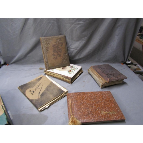 59 - FOUR PHOTO ALBUMS CONTAINING PHOTOS ETC