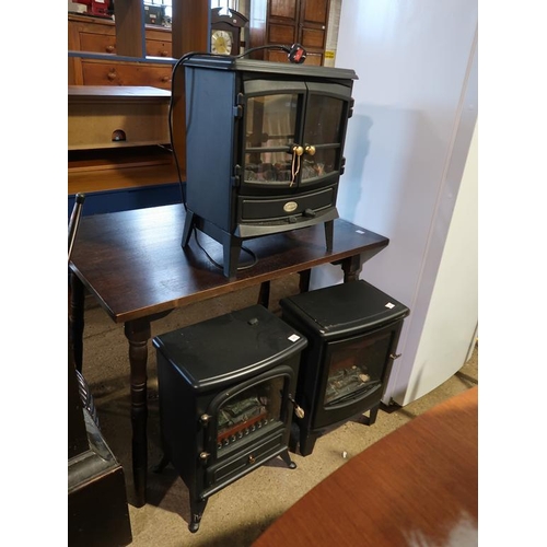 744 - THREE ELECTRIC STOVE HEATERS