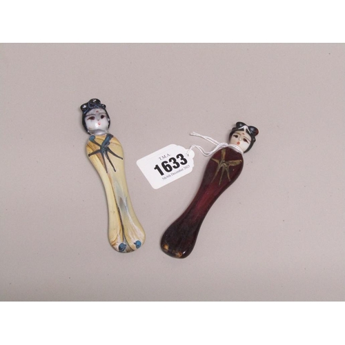 1633 - TWO JAPANESE GLASS TOMB MAIDENS