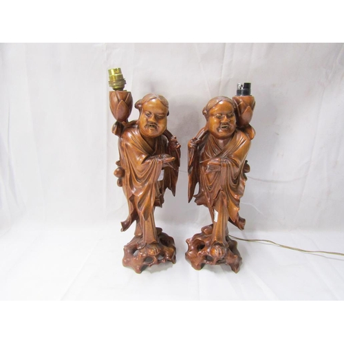 43 - TWO ORIENTAL WOODEN LAMPS A/F