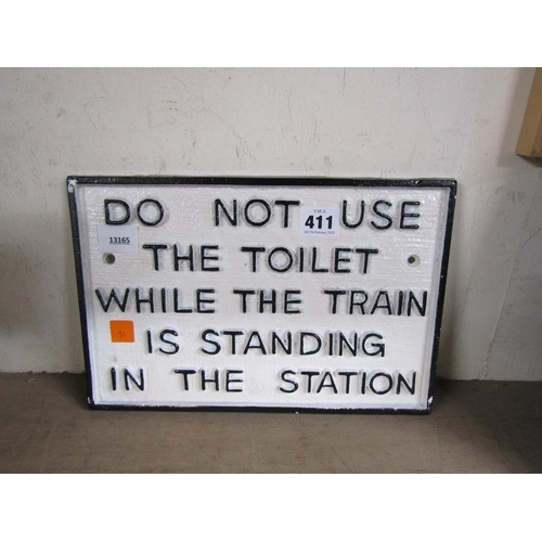 411 - REPRODUCTION CAST IRON SIGN