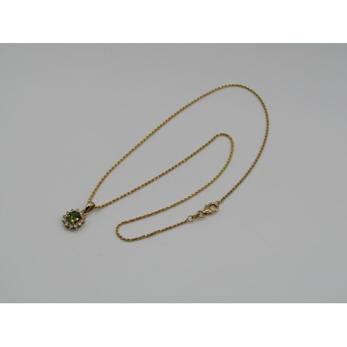 1580 - 18ct GOLD CHAIN WITH ATTACHED GREENSTONE DIAMOND PENDANT 4.3g appx and 41 cms inc clasps appx