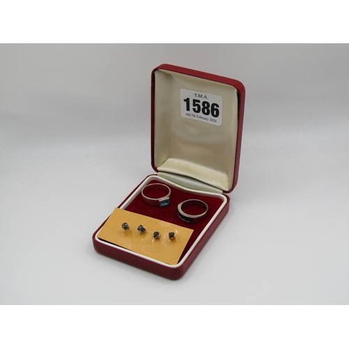 1586 - TWO SILVER STONE SET RINGS AND TWO PAIRS OF SILVER STONE SET EARRINGS