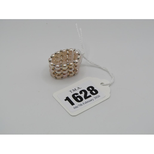 1628 - SILVER ARTICULATED SEED PEARL RING SIZE