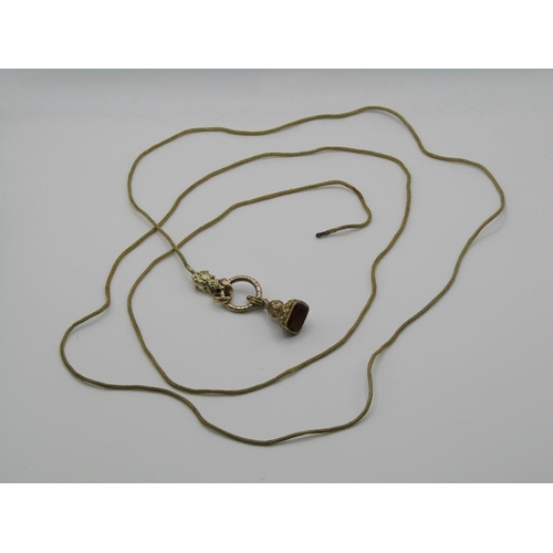 1545 - GOLD SEAL FOB WITH ATTACHED GOLD SPLIT RING ON A GOLD WOVEN ROPE NECKLACE