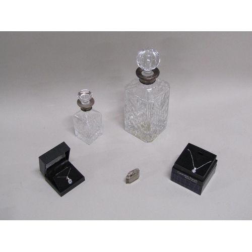 1702 - TWO SILVER NECKED DECANTERS PLUS LIGHTER AND COSTUME JEWELLERY