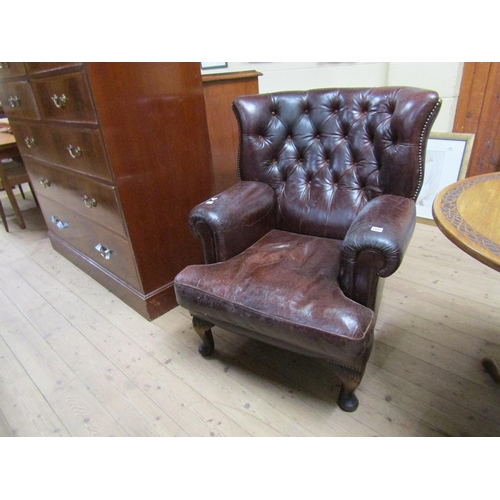 1893 - LEATHER UPHOLSTERED WINGBACK ARMCHAIR 82 x 100 cms