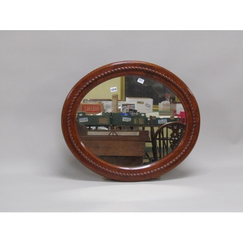 1210 - FRAMED OVAL WALNUT WALL MIRROR