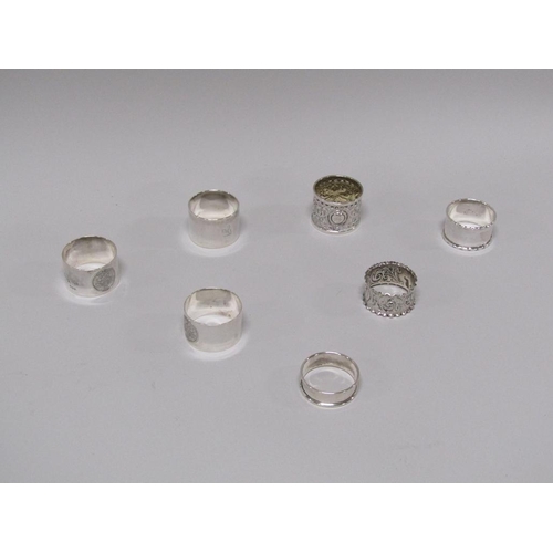 1476 - SEVEN SILVER NAPKIN RINGS 6ozt
