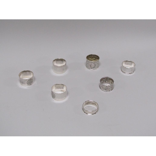 1476 - SEVEN SILVER NAPKIN RINGS 6ozt