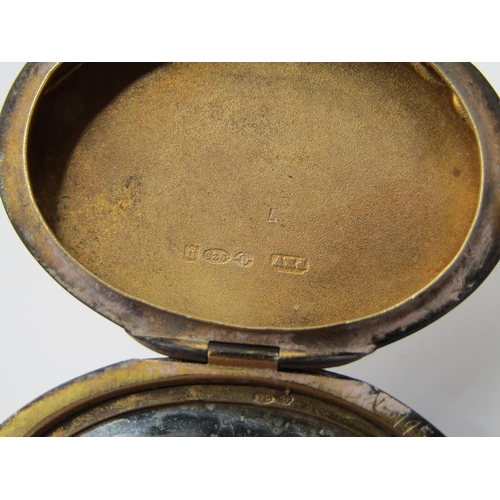 1452 - ENGINE TURNED SILVER AND BLUE ENAMEL COMPACT