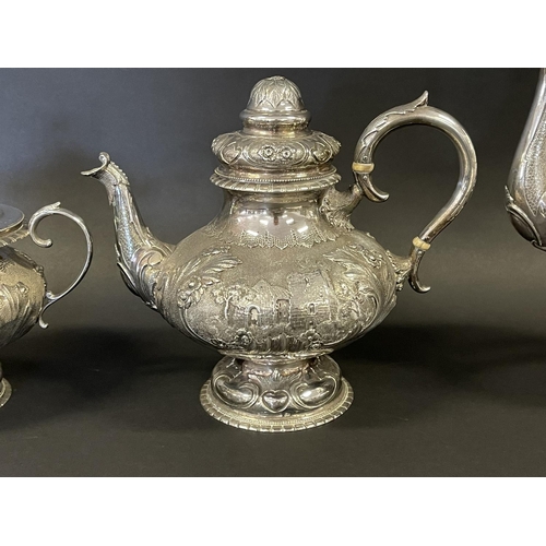 1163 - Antique sterling silver four piece tea & coffee service, each of baluster shape, and repousse worked... 