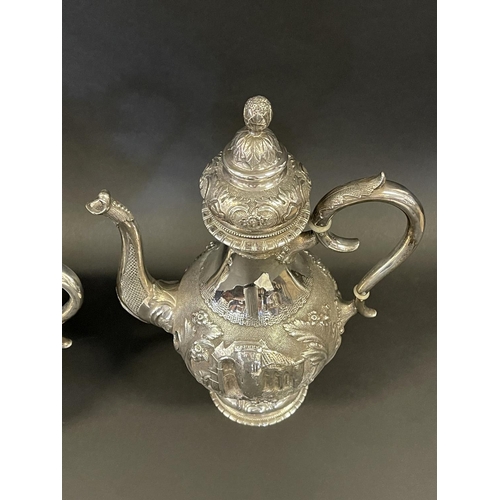 1163 - Antique sterling silver four piece tea & coffee service, each of baluster shape, and repousse worked... 