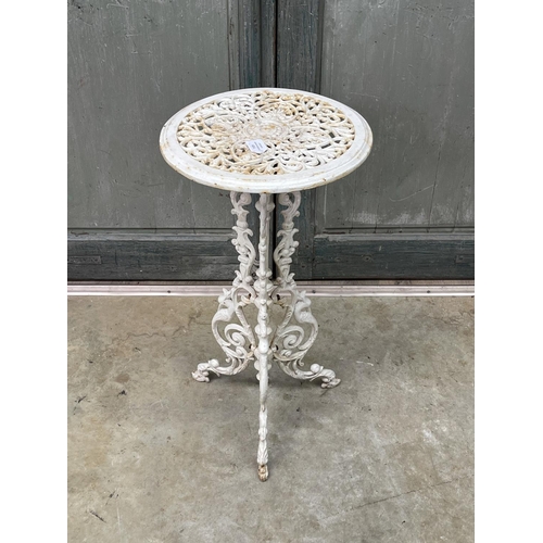 1131 - Tri legged circular cast iron plant stand, approx 69cm H x 36cm Dia