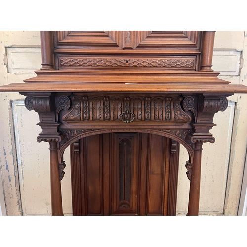 1072 - Antique French Renaissance Revival walnut hall or court cupboard on stand, carved figures to either ... 
