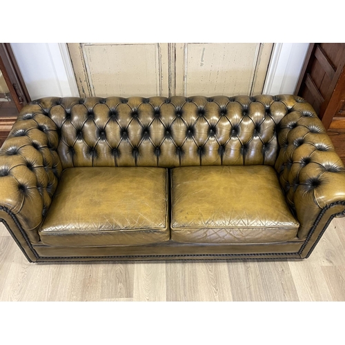 1101 - Moran parti leather deep buttoned three seater Chesterfield, approx 68cm H x 188cm W x 90cm D