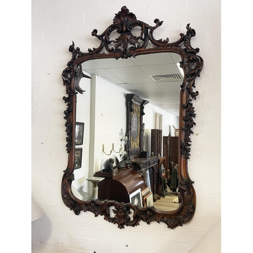 1115 - Antique style carved wood mirror, approx 138cm H x 89cm W