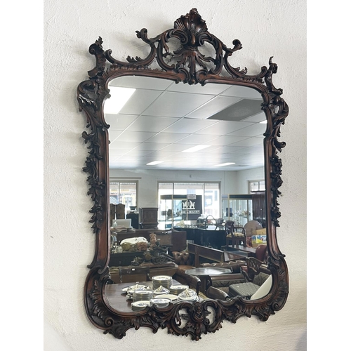 1115 - Antique style carved wood mirror, approx 138cm H x 89cm W