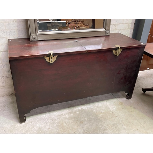 1118 - Large Asian red lacquered wood storage chest with double lift up covered with brass locking tabs, ap... 