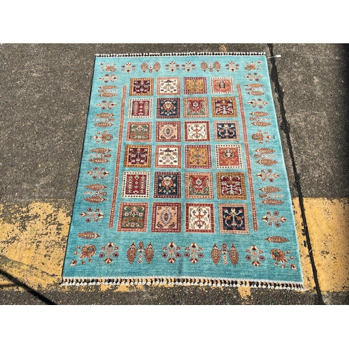 1128 - Hand knotted pure wool Afghan chobi carpet, approx 202cm x 149cm