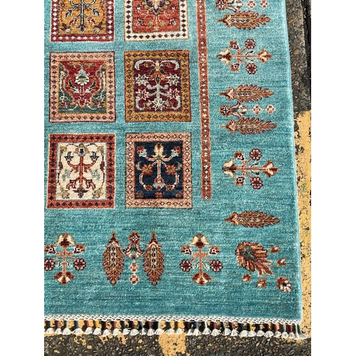 1128 - Hand knotted pure wool Afghan chobi carpet, approx 202cm x 149cm