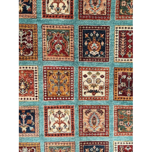 1128 - Hand knotted pure wool Afghan chobi carpet, approx 202cm x 149cm