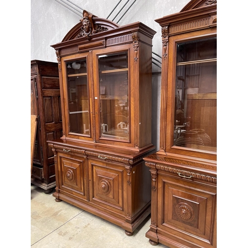 1136 - Pair of antique French walnut two height bookcases, each with a carved in high relief female mask ce... 