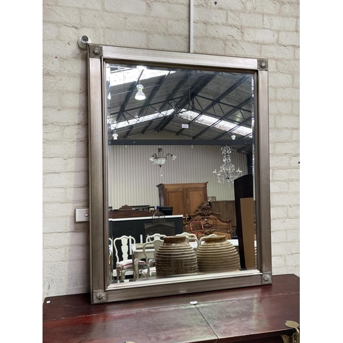 1142 - Antique style silvered framed bevelled glass wall mirror, approx 140cm H x 110cm W